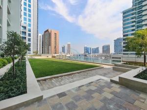 1BR Facing Canal and City Views, Just a Short Walk to Bus Stop and Marine Transport, Reva Residences, Business Bay by Deluxe Holiday Homes