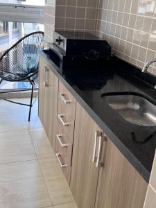Apartamento pé na areia