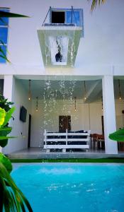 Private 8 Sleeper Waterfall Villa with private garden and cascading waterfall pool in Paje Zanzibar Prime location steps to Paje beach shops bars & restaurants WIFI AC TV