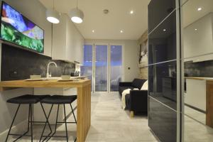 Lovely Studio with patio in basement floor.