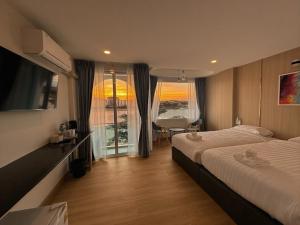 โรงแรมดีวิว โกลเด้นไทรแองเกิ้ล เชียงแสน - Dview Golden Triangle Hotel Chiangsaen