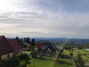 Chata u kostela