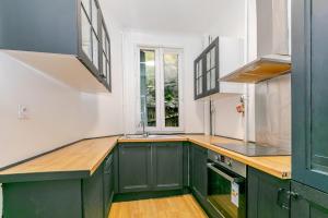 T2 Paris 19ème Buttes Chaumont - II