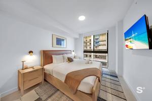 High-Rise Skyline Escape King Bed & Balcony