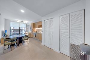 High-Rise Skyline Escape King Bed & Balcony