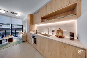 High-Rise Skyline Escape King Bed & Balcony