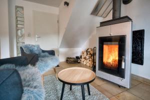Große Wohnung am Wald mit Aussicht, Sauna, Kaminofen, Grill