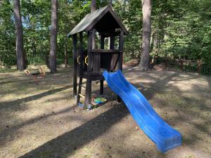 Ferienhaus Ostsee- Strandkoerbchen- Waldblick