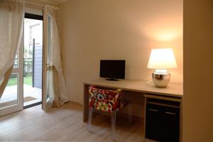 ampio appartamento con giardino e box