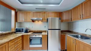 Vacationer Holiday Homes l Cozy 1 Bed l Partial Sea View l Prime Location