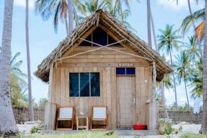 Feet-in-the-sand bungalows Mafia Island - 2354