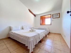 Flat com 1 quarto com ar split, sala e cozinha completa, No condomínio Portal do Atlântico a 100m praia de Taperapuã (Barraca do Gaúcho) , portaria 24hrs, piscina.