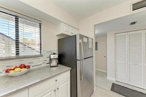 Blissfull Bay: Runaway Bay - Bayfront Condo! Largest Heated Pool by Anna Maria Life Vacation Rentals