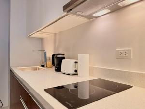 1BR Peaceful Condo Stay, Tambuli Seaside Living