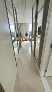 Cobertura dúplex frente mar