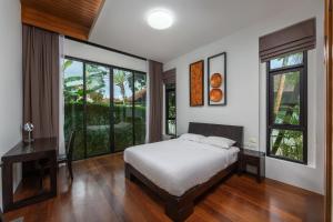 Aroha Villa with Private Pool Near Nai Harn Beach by TropicLook