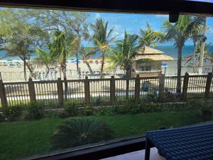 Araça Praia Flat, apartamento 203, Frente mar, Pe na areia!!!!!