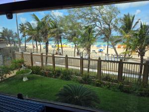 Araça Praia Flat, apartamento 203, Frente mar, Pe na areia!!!!!