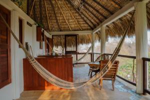 Columpio del Reptil cabaña