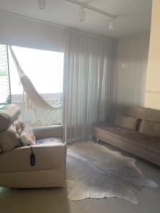 Apê de fundos em condo beira mar com garagem e Wi-Fi