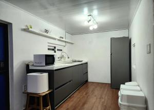 Soonbigi 순비기 Jeju Stone House in Seogwipo