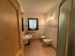 Villetta rifugio tra i larici