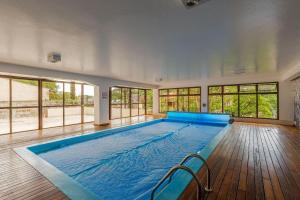 Apto 1 dorm e Piscina aquecida by Achei Gramado