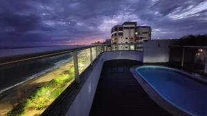 Conforto e sofisticação pé na areia!