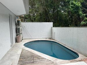 Apartamento térreo com piscina - Rivieira de São Lourenço - Módulo 2