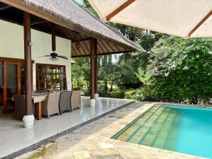 Beachfront Villa Nirwana with Private Jacuzzi