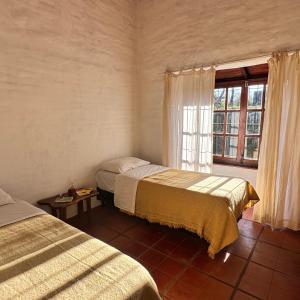 Casita Lavanda - cercana a plaza de Villa de las Rosas con patio y asador