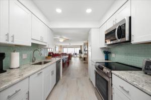 Dreamy Ocean Views in this 3 Bedroom English Towers Condo with Indoor Pool!