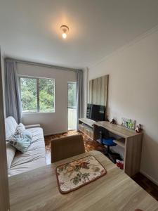 Apartamento com AR, proximo a roda gigante com lazer