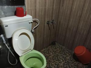 Wood House near Kallar Waterfall