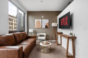 Premium Downtown High-Rise Condo with Pool, Parking, Gym