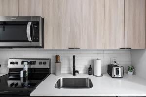 Premium Downtown High-Rise Condo with Pool, Parking, Gym