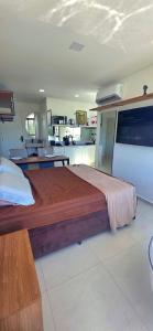 cobertura pé na areia com banheira vista mar