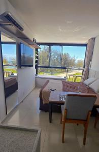 cobertura pé na areia com banheira vista mar