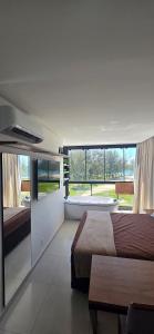 cobertura pé na areia com banheira vista mar