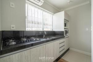 Apto prox a praia e com churrasqueira IBL103