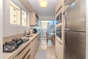 Vista Mar A passos da Praia 3 suítes 3 Vagas