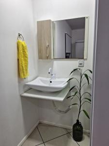 Casa prática e acolhedora na Praia do Santinho