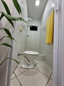 Casa prática e acolhedora na Praia do Santinho