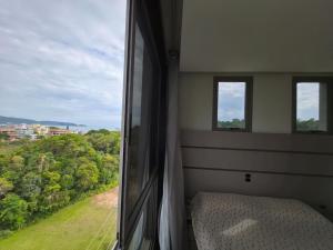 Apartamento com Vista Mar e Piscina