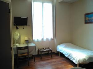 Hotels Hotel du Commerce : photos des chambres