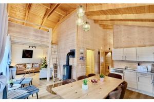 10-Personen-Wellness-Chalet in erster Reihe am See