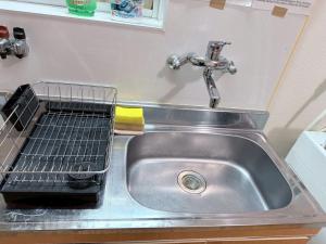 Wide bright room with three beds!