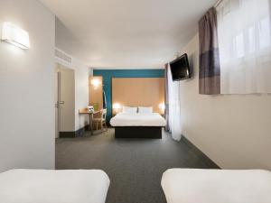 Hotels B&B HOTEL Grenoble Centre Alpexpo : Chambre Quadruple