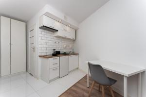 Traugutta Cozy Studio by BookingHost