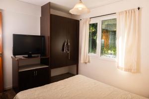 La casita del bosque - cerca al lago - ideal para parejas y familias